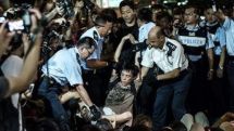 Hong Kong police arrest democracy protesters at sit-in