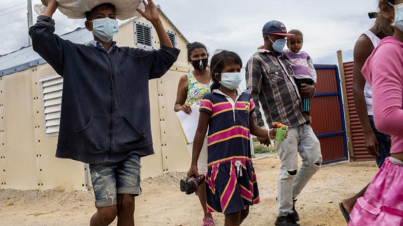 Amid pandemic, number of people forced to flee homes has risen, UN says