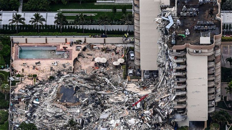 Rescuers listen for signs of life in Miami rubble