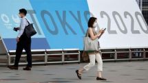 Tokyo may extend coronavirus curbs into Olympics period