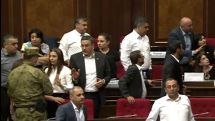Video shows security officers grabbing opposition lawmaker's hair and pulling her out of the NA session hall