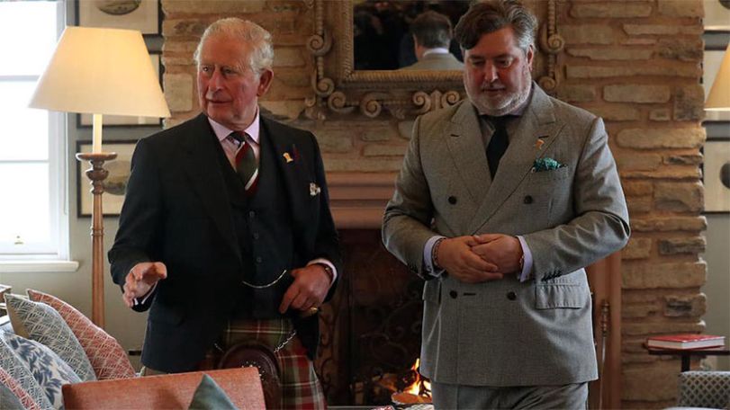 Former aide to Prince Charles quits charity role amid honor claims