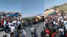 Police officers use force to open interstate road blocked by farmers