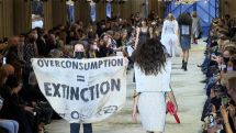 Climate activists invade Louis Vuitton fashion show in Paris