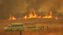 Wildfire in southern California shuts down major highway and forces evacuations