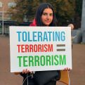 "Don't remain silent!" - Young ARFD members protest outside the International Court in the Hague