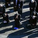 French bishops kneel in show of penance over Catholic church’s role in child abuse