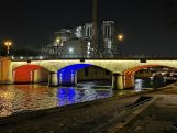 Paris bridge lit up in colors of Armenian and French flags
