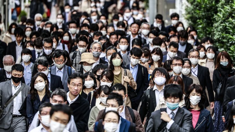 Japan says it will remove more COVID restrictions