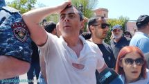 Opposition leader's shirt torn amid clashes between police and protesters in Yerevan