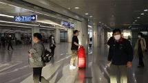 China cuts COVID quarantine period for international travellers