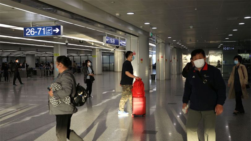 China cuts COVID quarantine period for international travellers