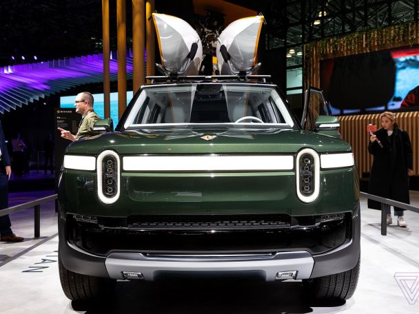 Apple CEO Tim Cook takes ride in Rivian electric pickup