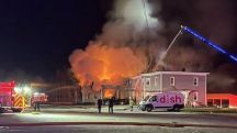 Small plane crashes into New Hampshire apartment block