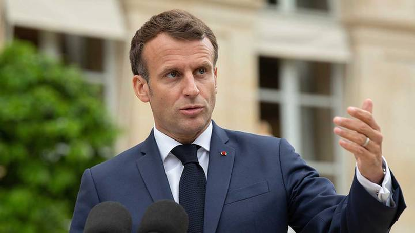 Macron says he maintains regular contact with Putin