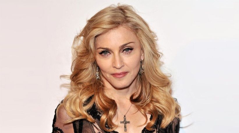 Madonna goes into intensive care, postpones tour