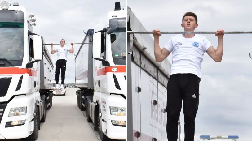 Armenian teen breaks world record performing pull ups between moving trucks