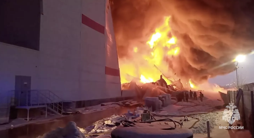 Firefighters battle to put out huge fire at Russian online retailer's warehouse